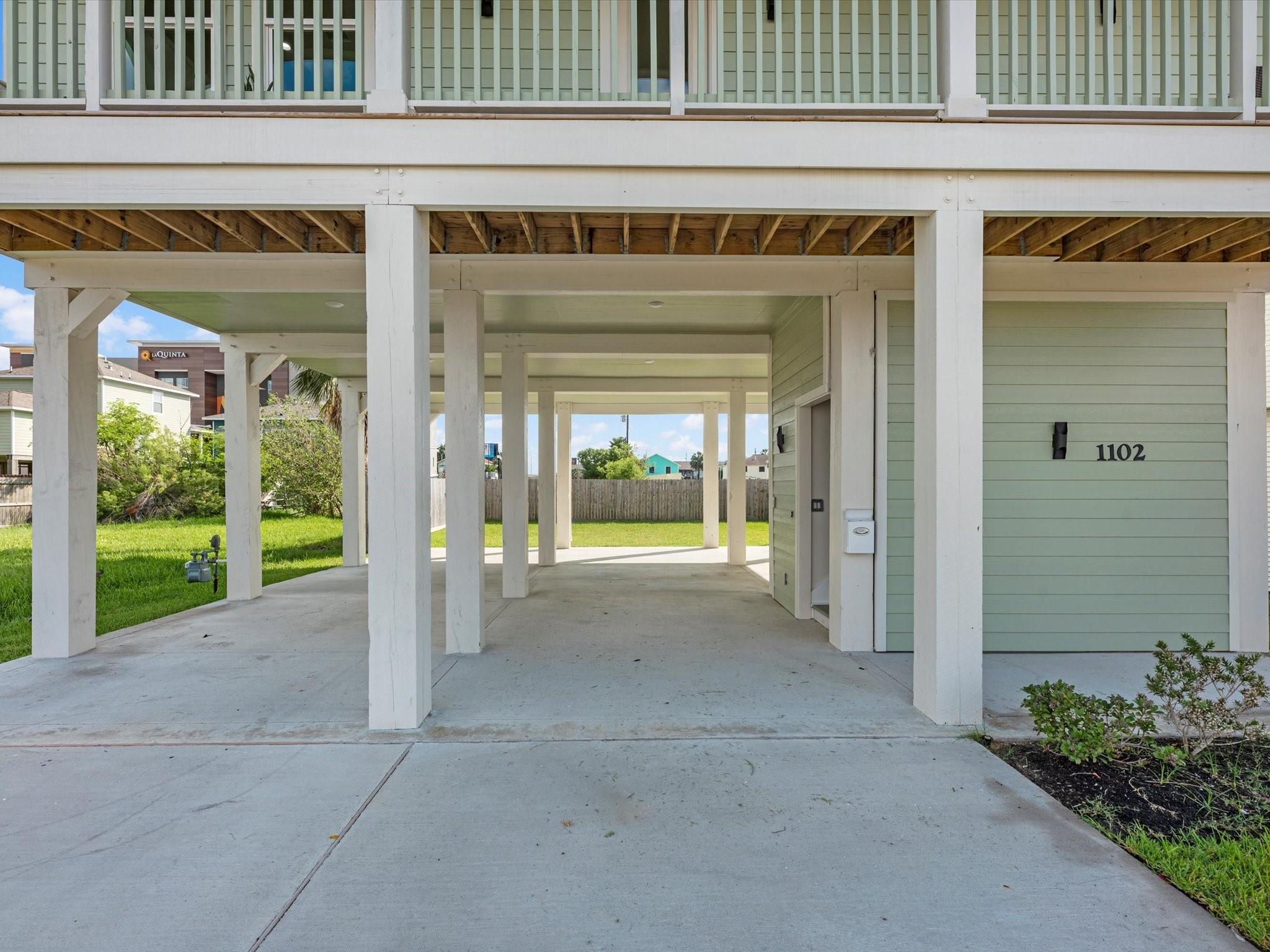 Image 3: The long, expansive driveway provides ample parkin