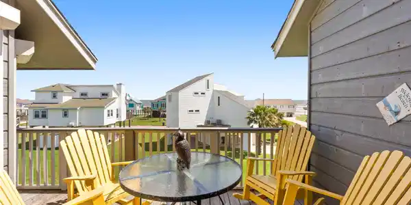 Image 2: Beach views and Gulf breezes from the top floor ba