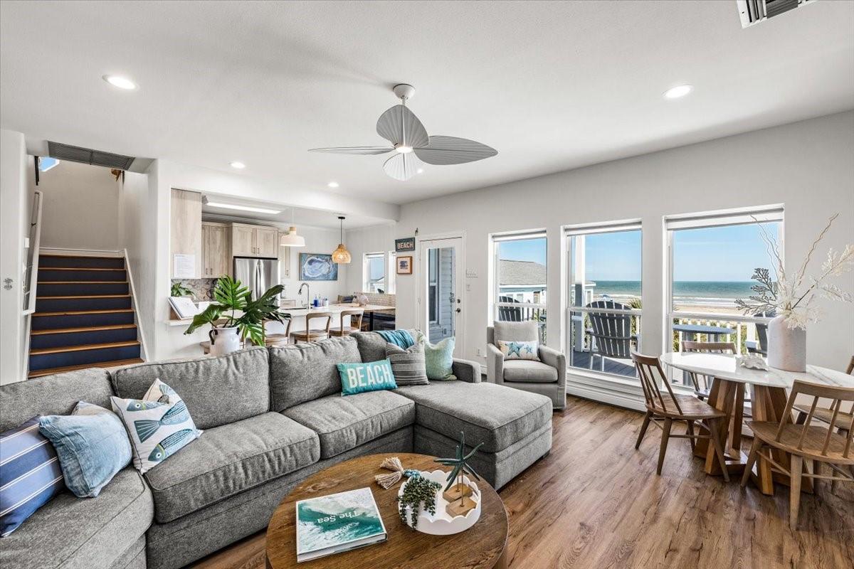 Image 4: This bright and airy living space features ocean v