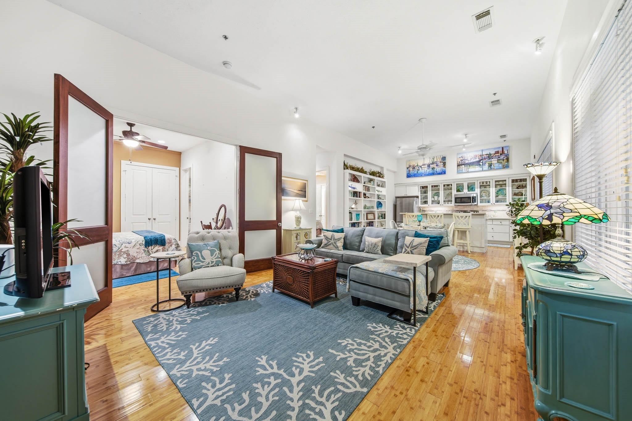 Image 2: View of the living room looking into the secondary