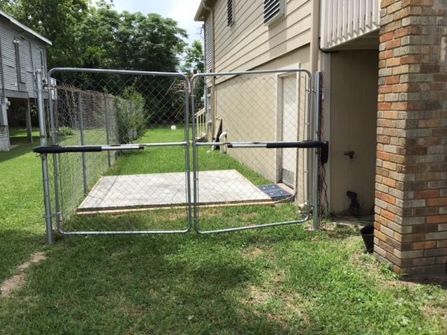 Image 3: Side of house with auto gate