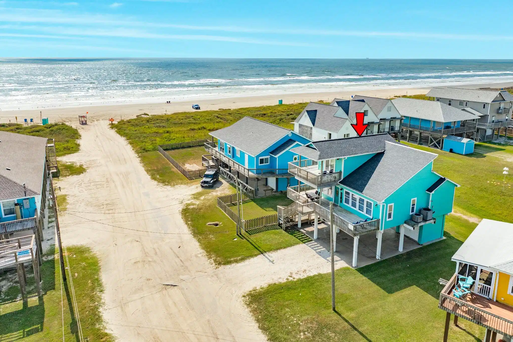 Image 1: Just steps from the shoreline, this property offer