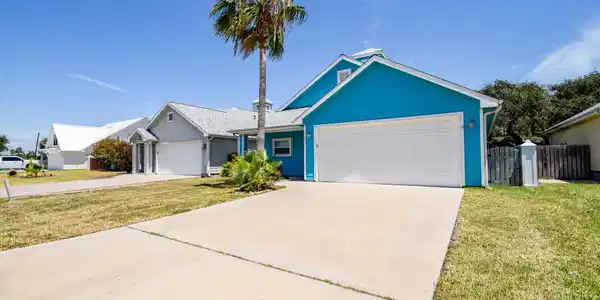 Image 3: Long, double wide drive way.