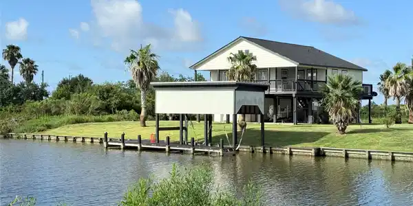 Image 3: Spacious waterfront home with a raised design, sur