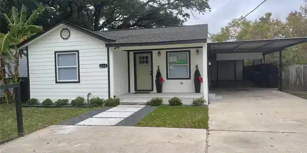 Image 2: Charming single-story home with a welcoming front