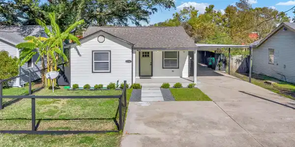 Image 3: Charming single-story home with a welcoming front