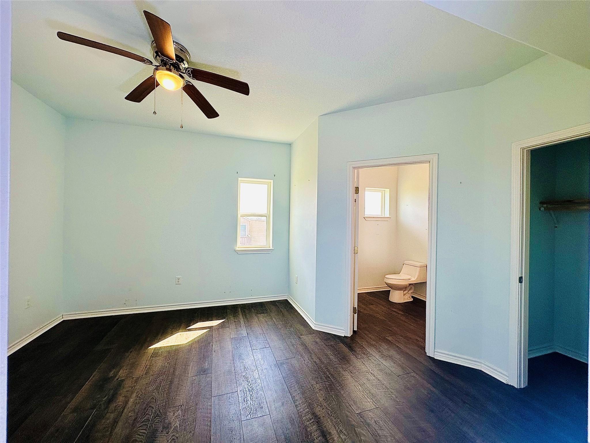 Image 4: bedroom to the left of entrance