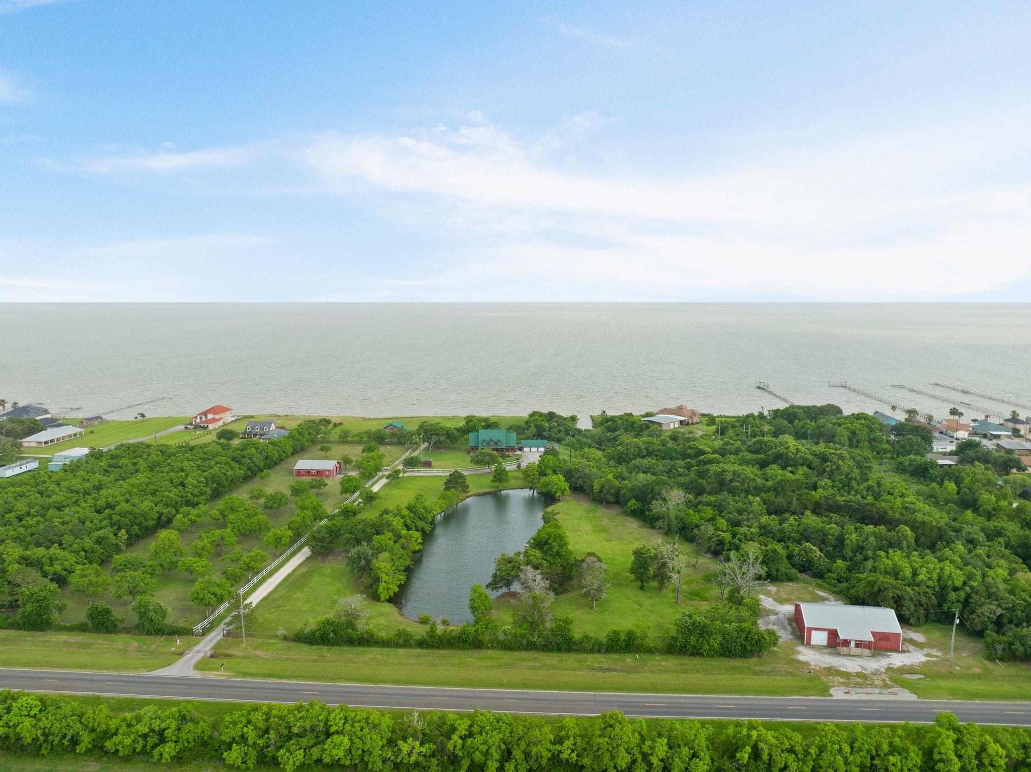 Image 4: Aerial views reveal the full property layout, incl