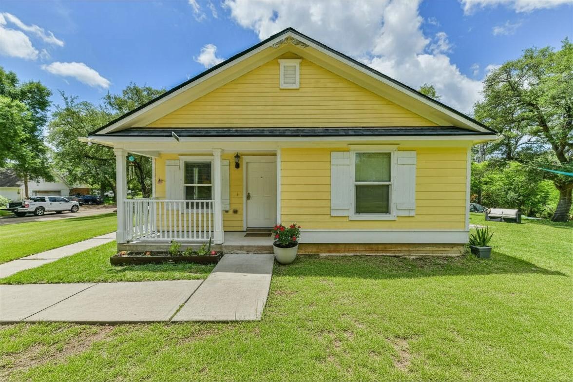 Image 2: Cozy front porch.