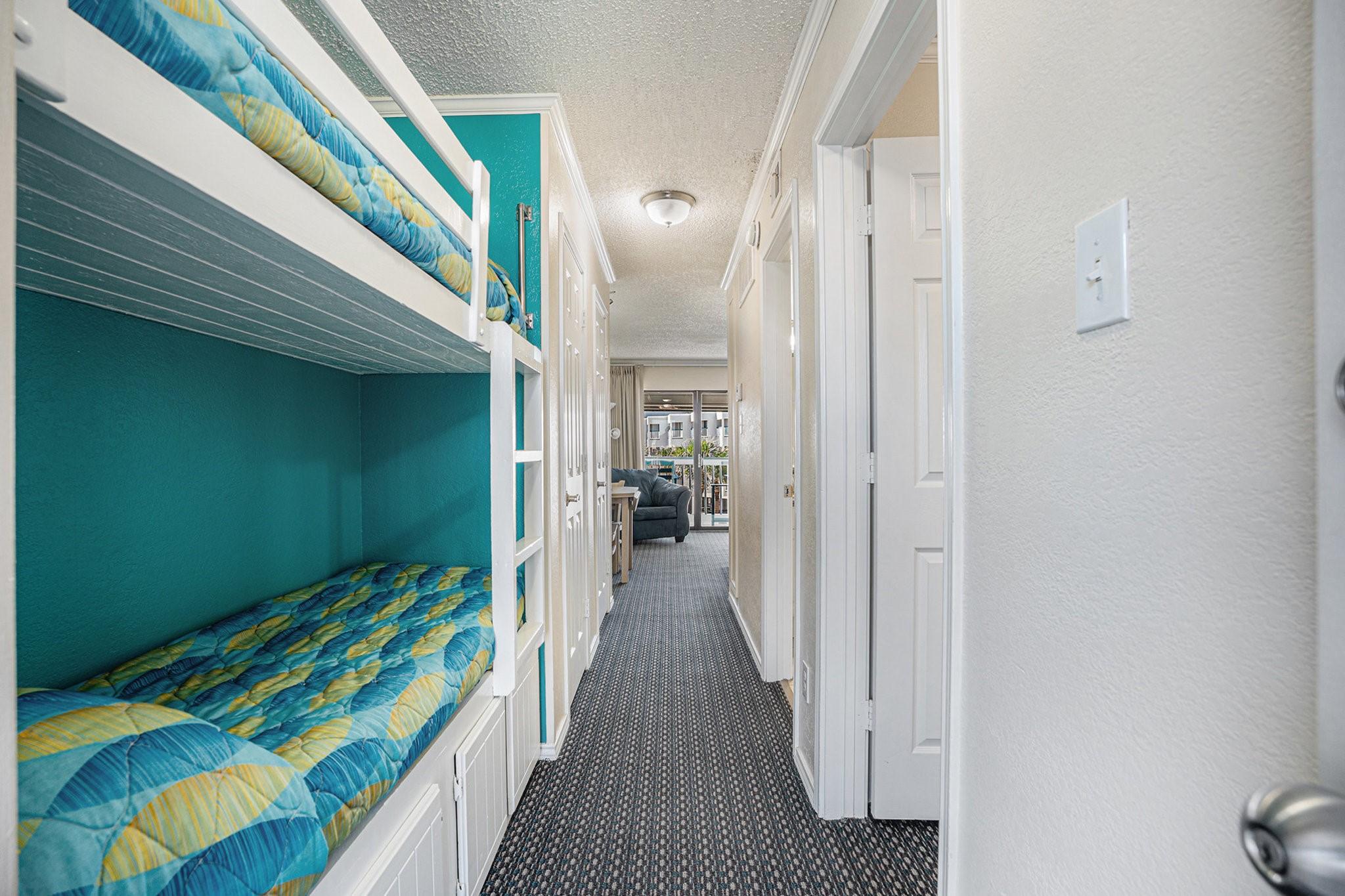 Image 2: Upon entry you&rsquo;ll find a set of bunk beds for extr
