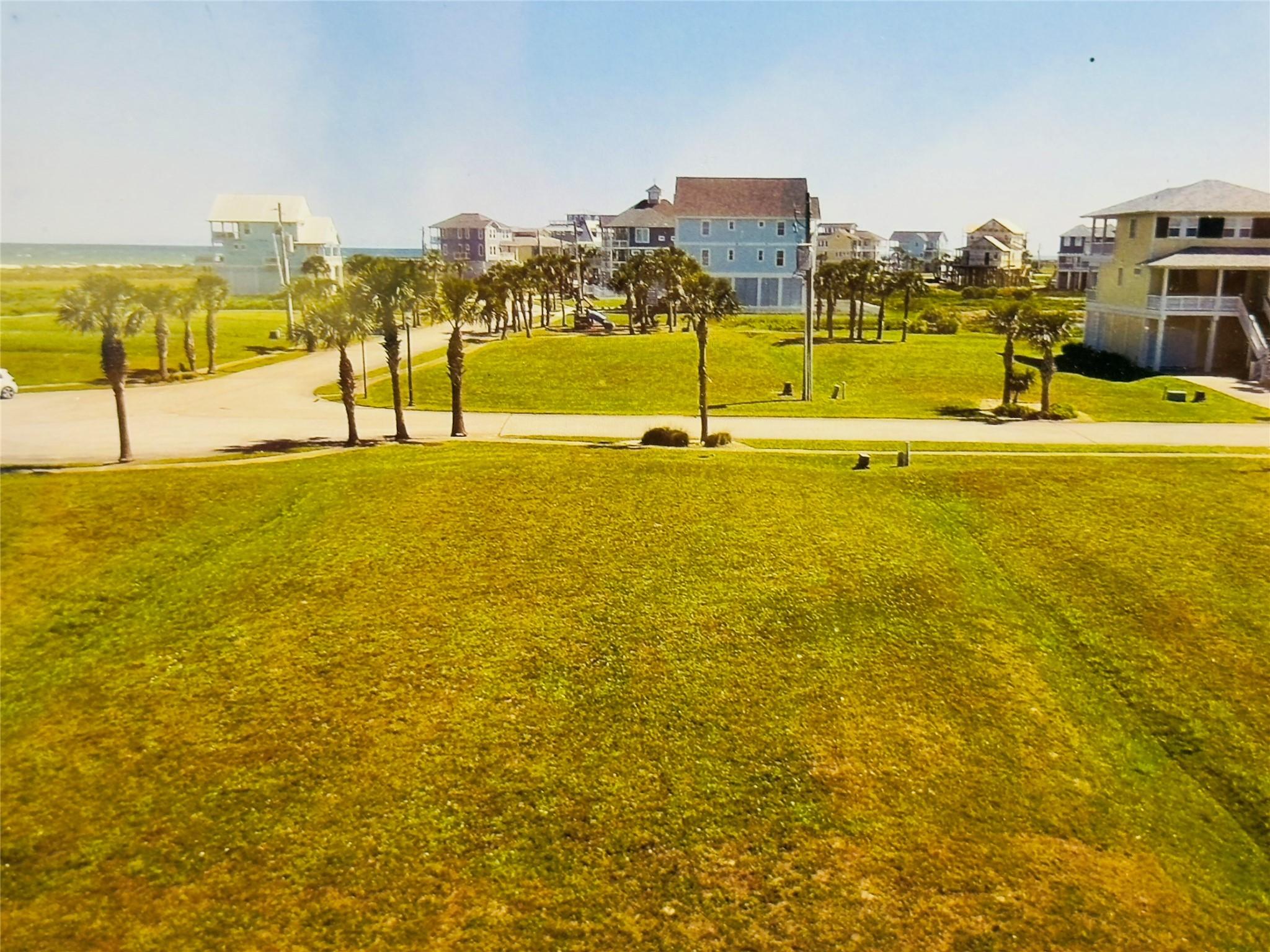 Image 1: Beach views on your build ready lot! Plans are inc