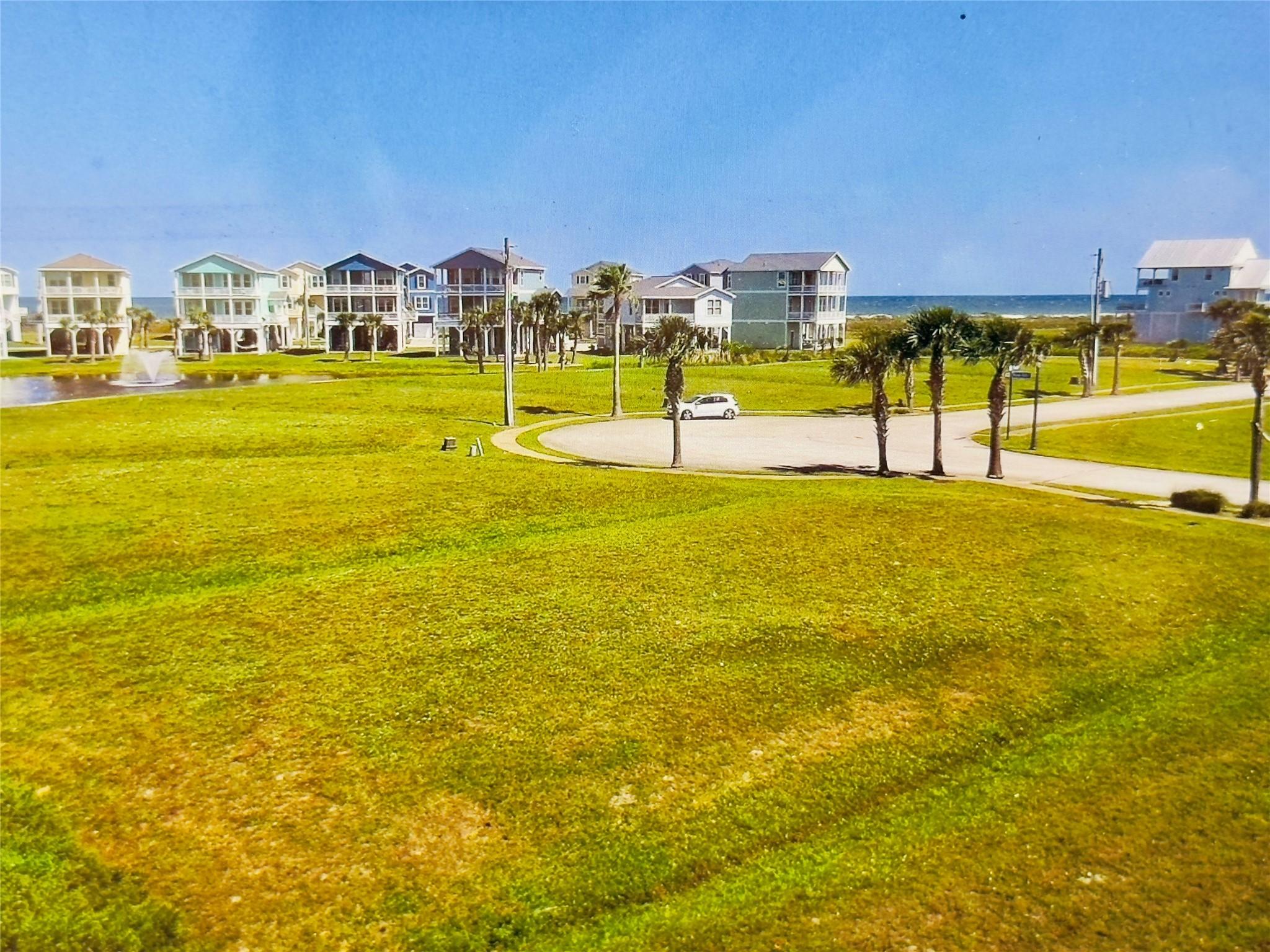 Image 2: HOA mows the lot until constructed!