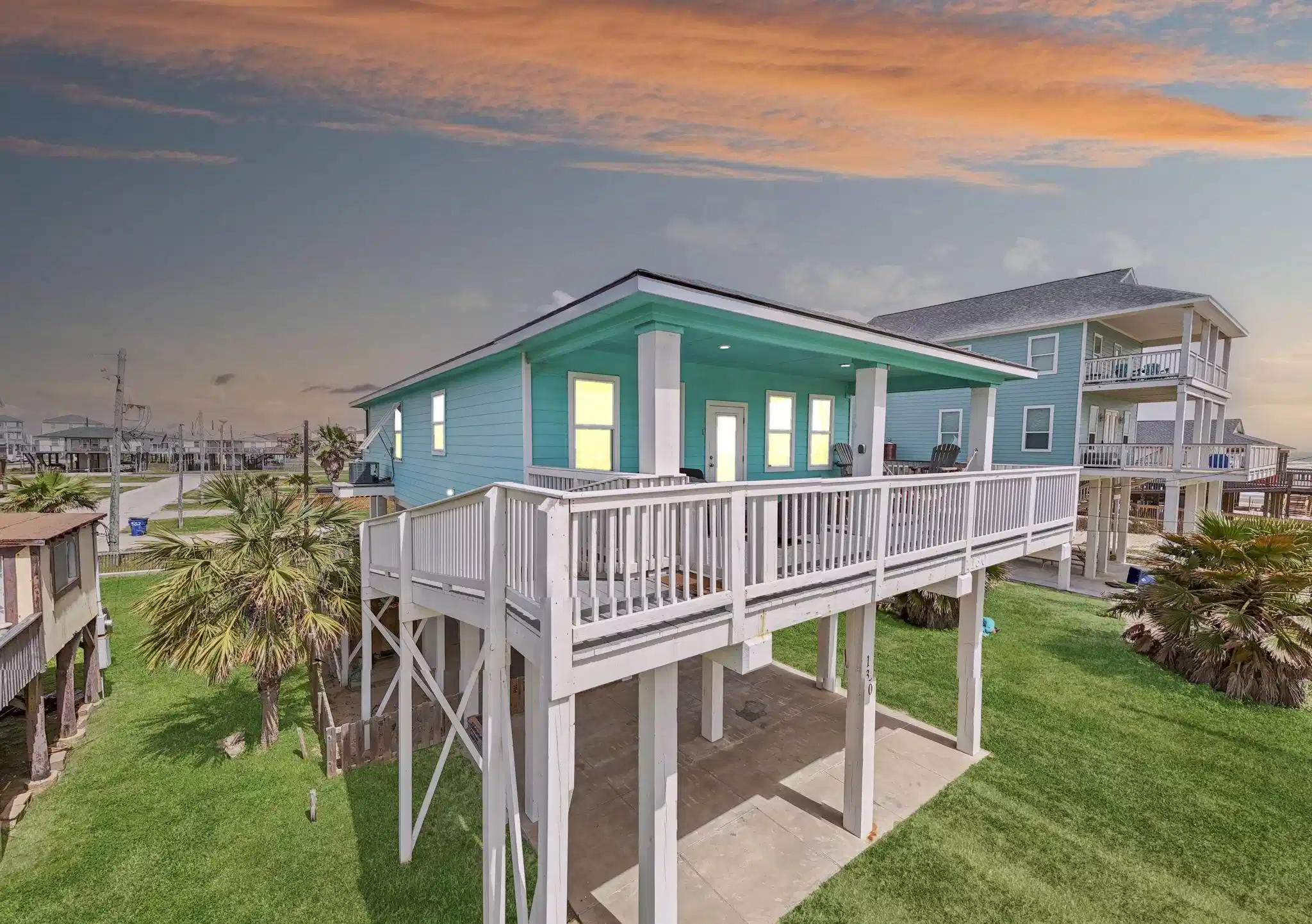 Image 1: Modern beach house with a ramp that is steps from