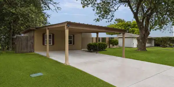 Image 2: The large carport and long driveway easily accommo