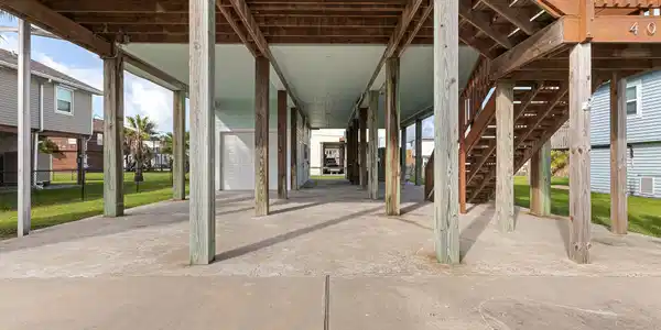 Image 3: Extra wide driveway has ample parking