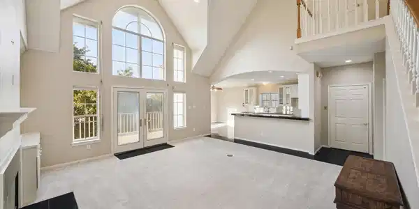 Image 3: Soaring vaulted ceilings with large arched windows