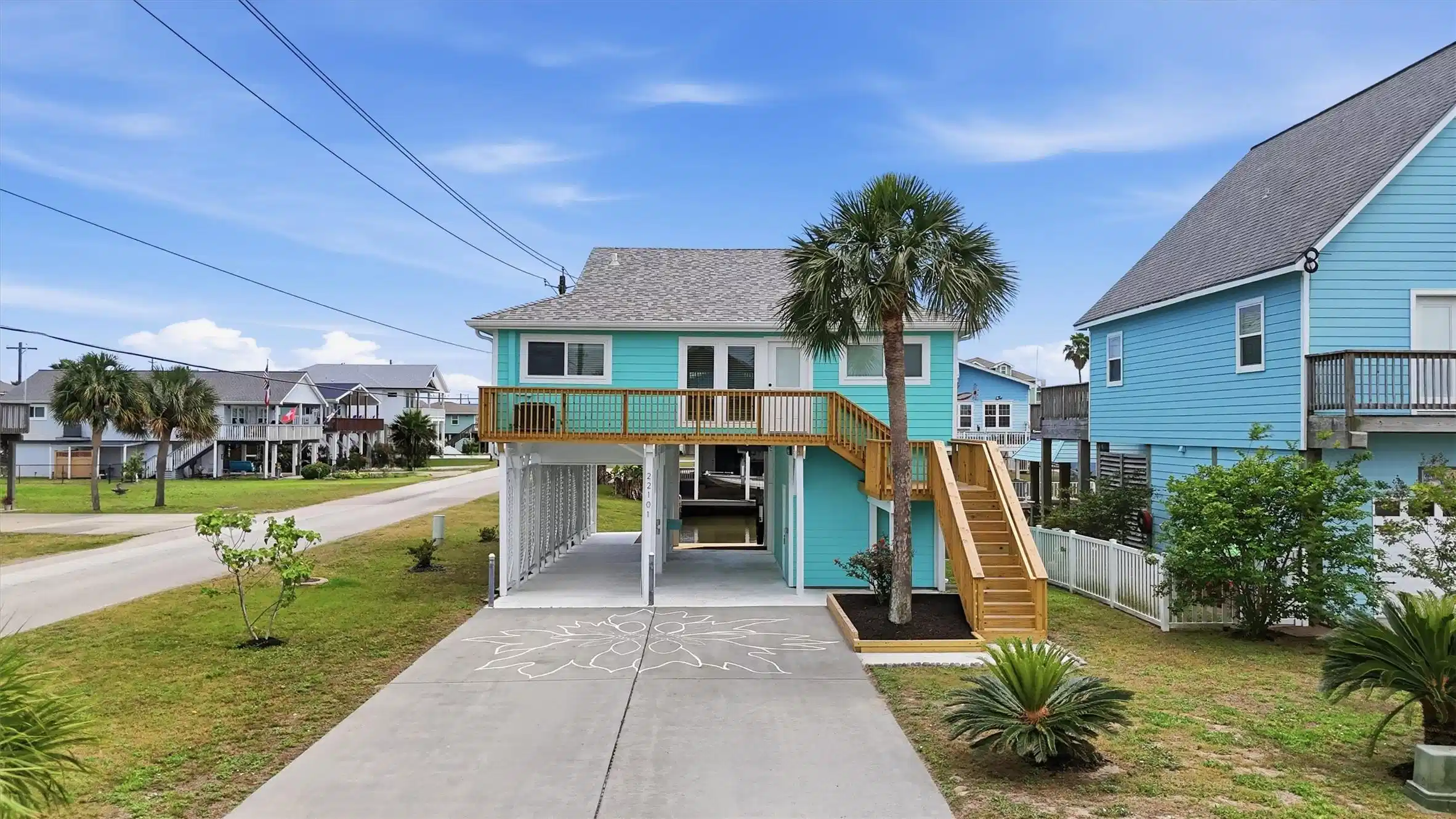 Image 1: Fresh coastal curb appeal welcomes you to this bea