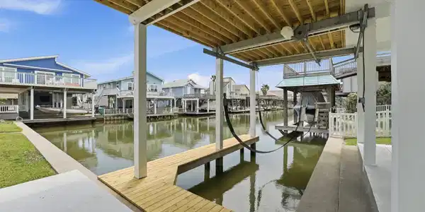 Image 4: Private canal access with a boat lift makes it eas