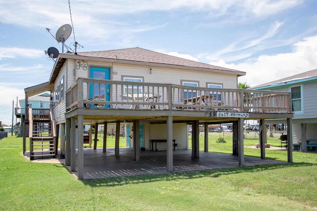 Image 2: Elevated Crystal Beach cottage featuring a spaciou