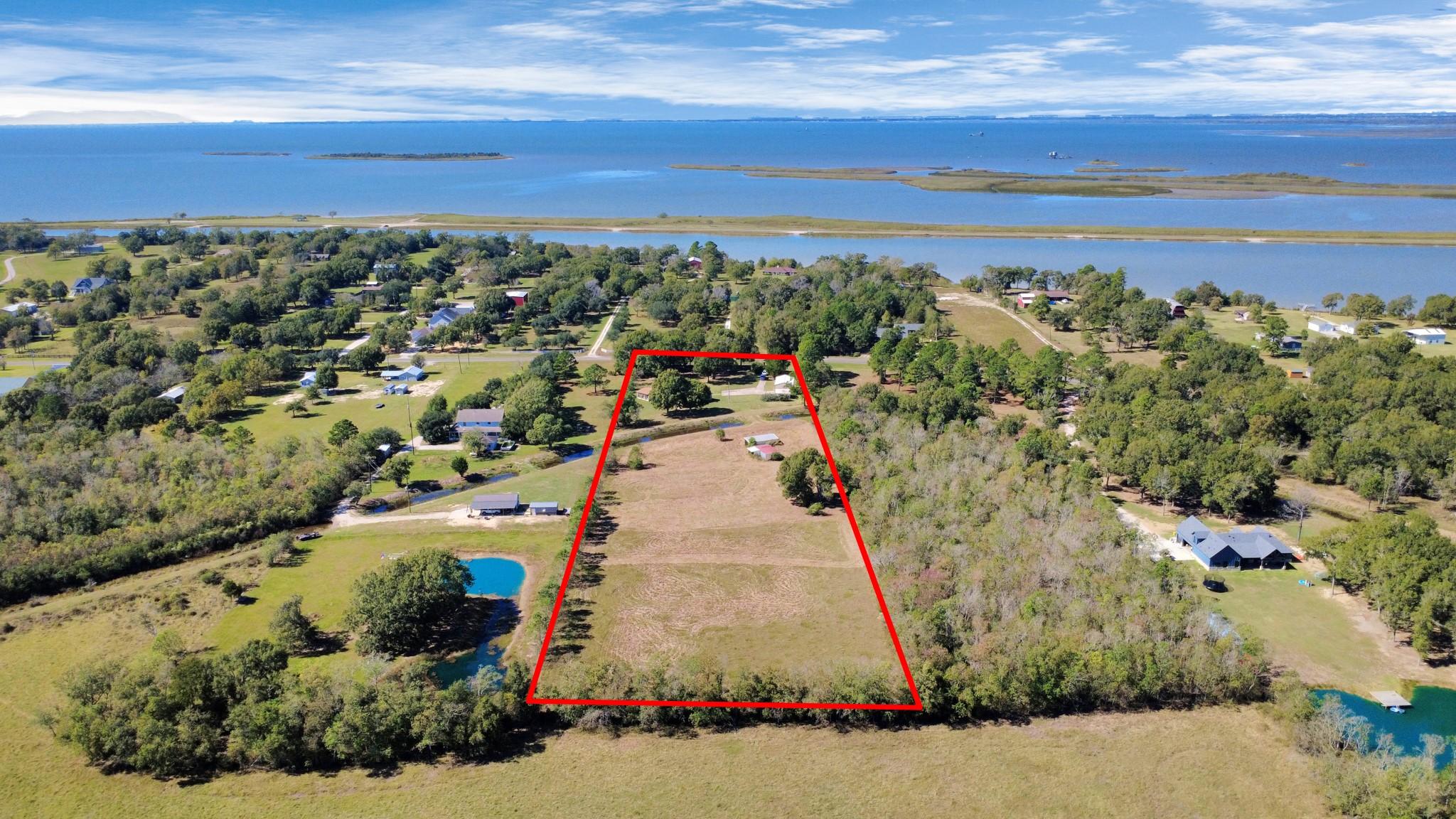 Image 2: An aerial view of 3607 S Main Street, Anahuac, TX