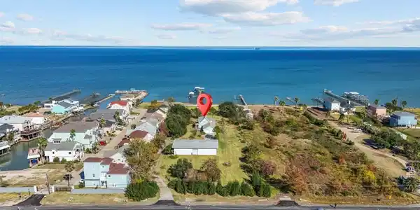 Image 4: AN AERIAL SHOT OF THE PROPERTY.  THIS SITE IS UNIQ