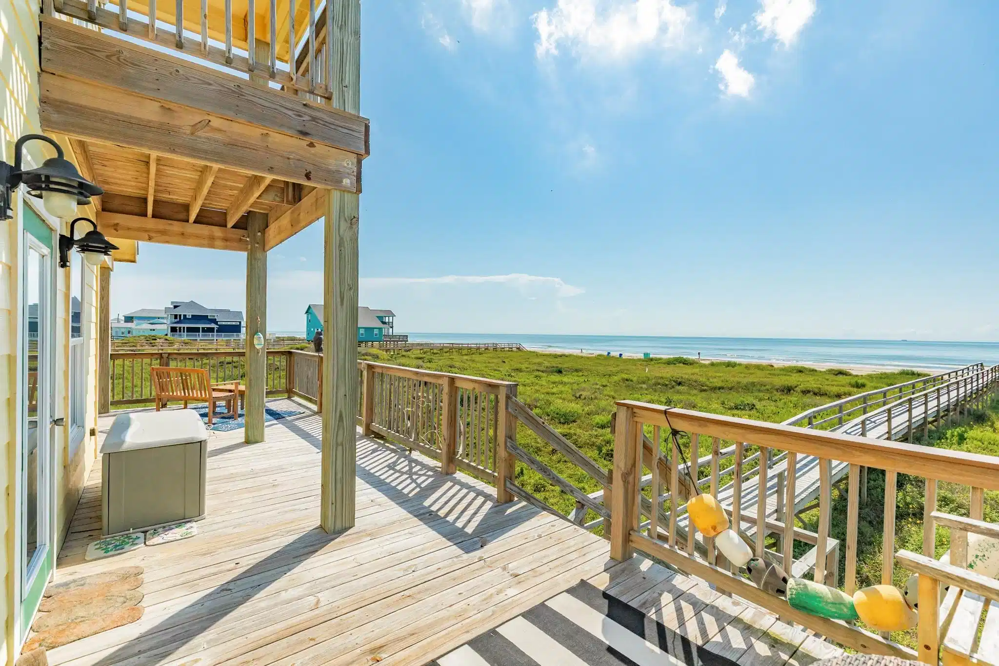 Image 1: Spacious covered entry deck with beach views, idea