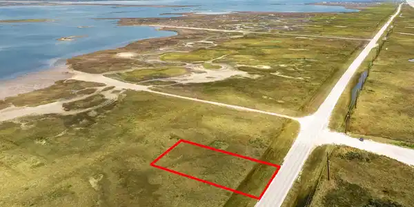 Image 4: Angled aerial showcasing the lot&rsquo;s proximity to bo