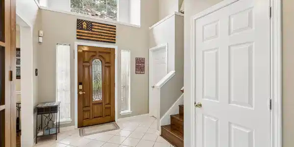 Image 4: Front door, the utility is directly to the right o