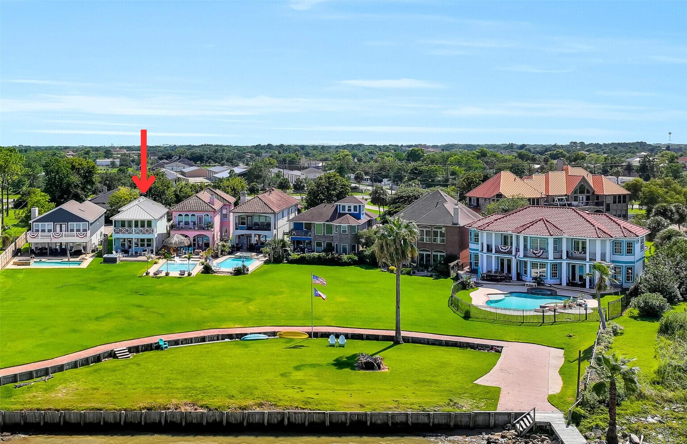 Image 4: The small, gated community shares this extensive g