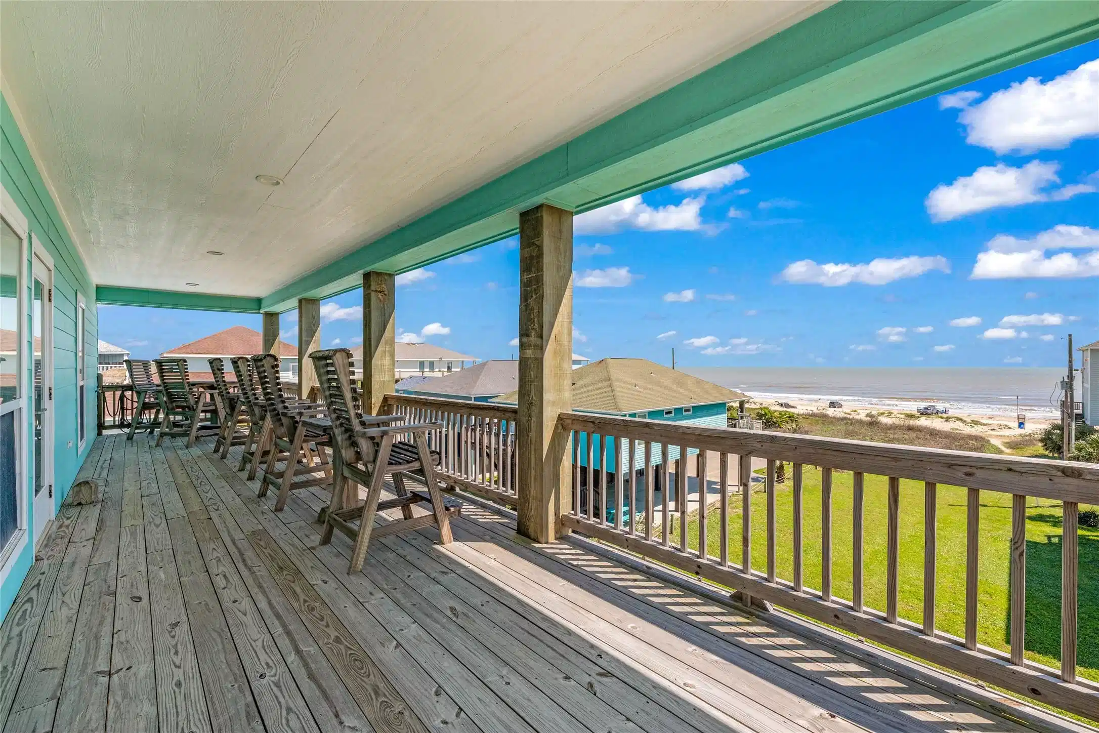 Image 1: Expansive upper deck with ample outdoor seating, p