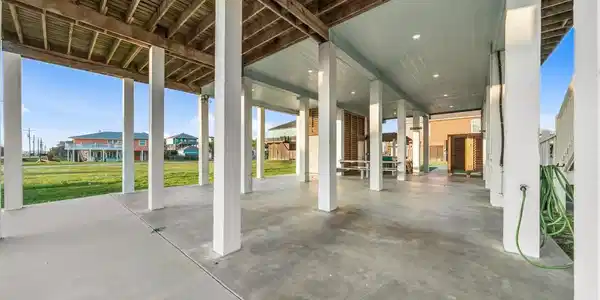 Image 4: Open ground-level area features plenty of room for