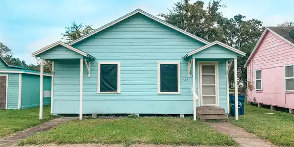 Image 2: Fresh exterior paint in a nice coastal color.