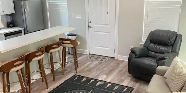 Image 3: Living Area facing Entry