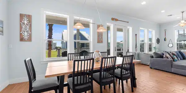 Image 4: This bright, open-concept living and dining area f