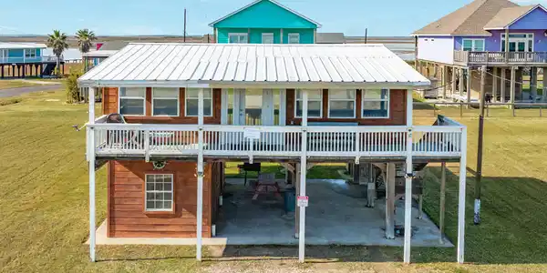Image 2: Exterior &ndash; Front Elevation &ndash; Elevated coastal home
