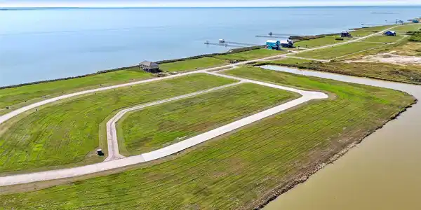 Image 3: This photo showcases a scenic waterfront property