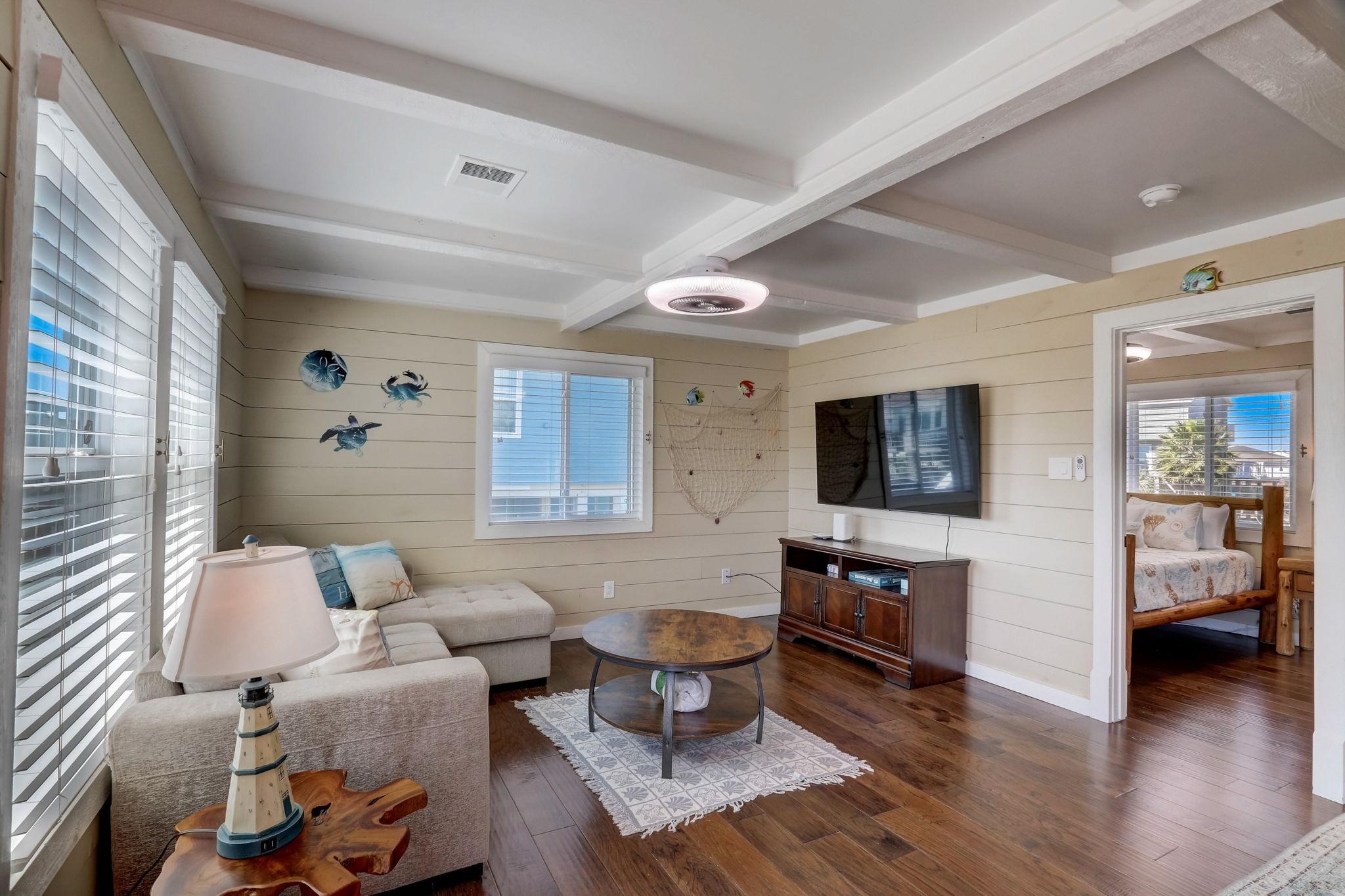 Image 3: In this cozy living room, the warmth of the space
