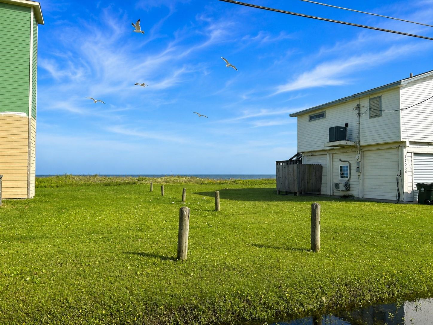 Image 4: You can see the ocean! This is the lot across the