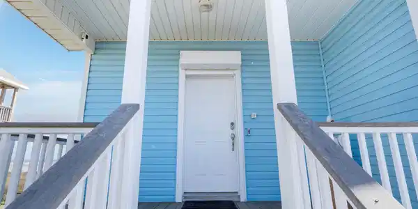 Image 4: Charming entryway with a welcoming front porch