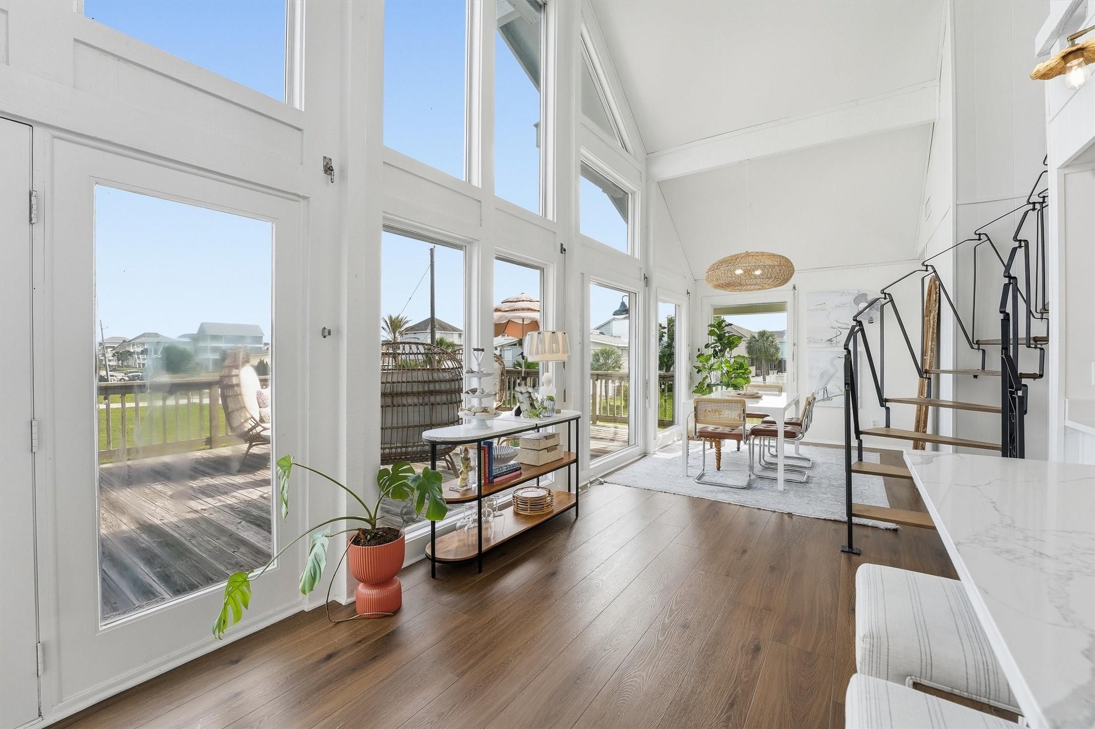 Image 2: Step inside to a light-filled open-concept layout