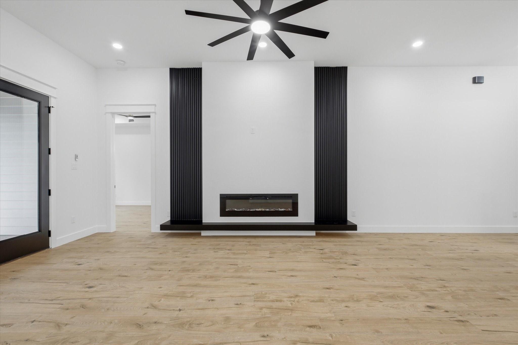 Image 3: A Dramatic Focal Point. Cozy up in style! This str