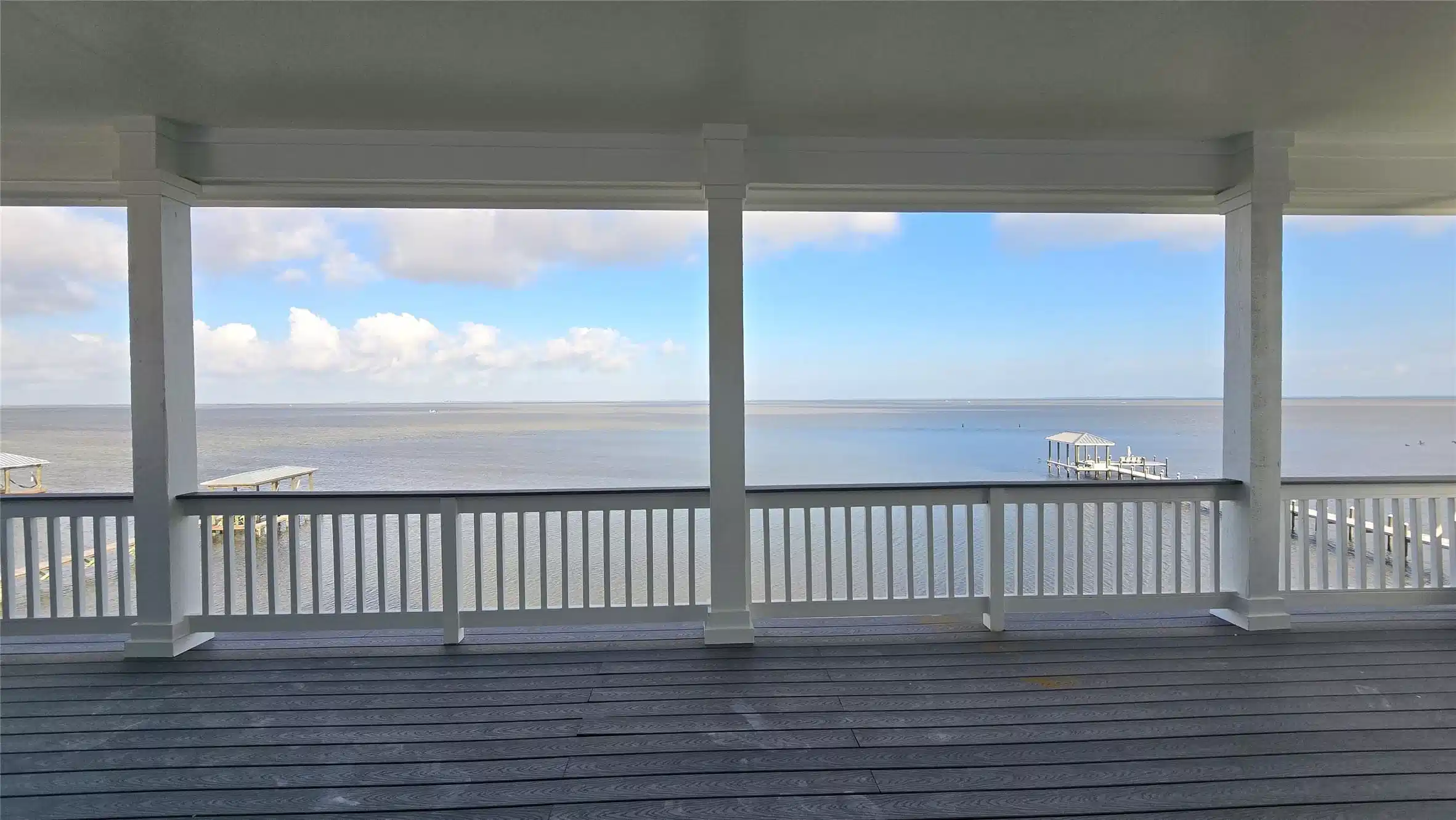 Image 1: Top deck on 2nd floor and the beautiful Galveston