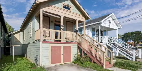 Image 2: Charming elevated home with a welcoming front porc