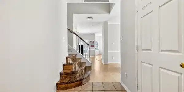 Image 3: Enter the home and to the right is a private home