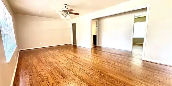 Image 3: Welcome home to these gorgeous hardwood floors.