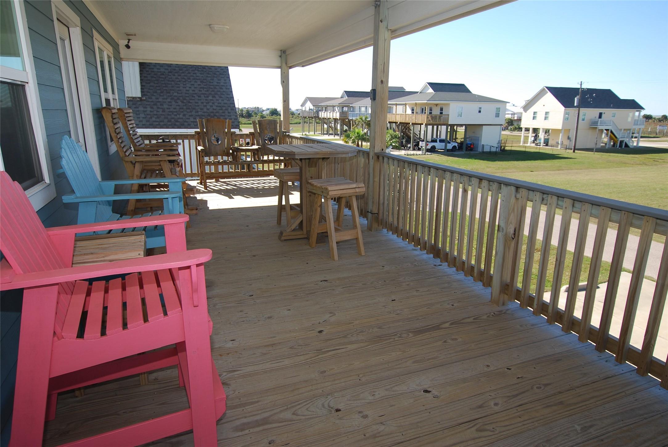 Image 2: Nice front deck with plenty of seating room.