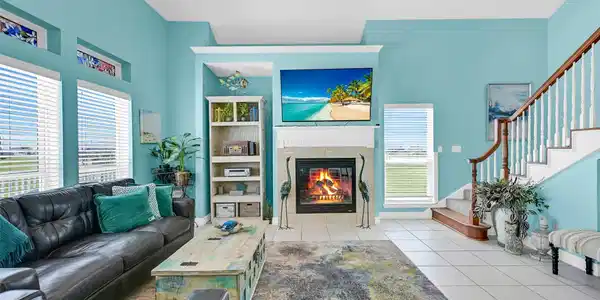 Image 4: The living room offers plenty of space to relax an