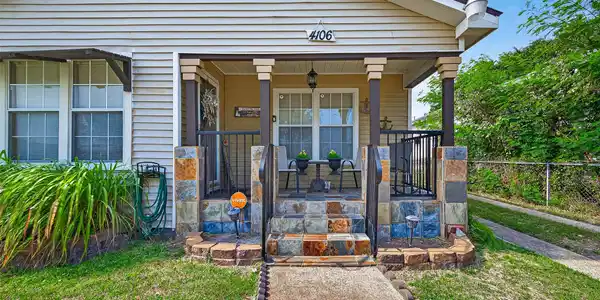 Image 3: Charming curb appeal with a serene front porch.