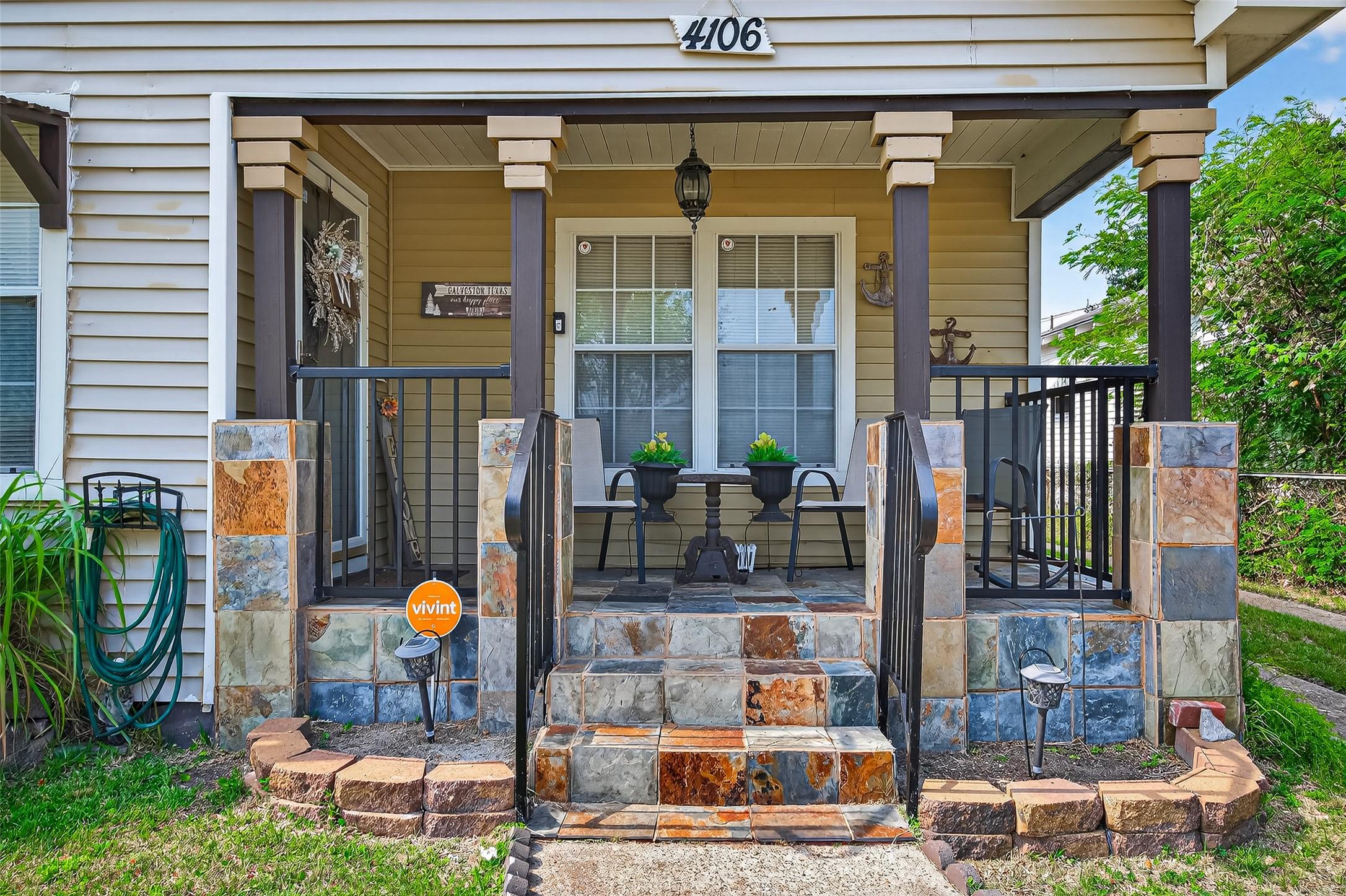 Image 4: Charming front porch featuring elegant slate tiles