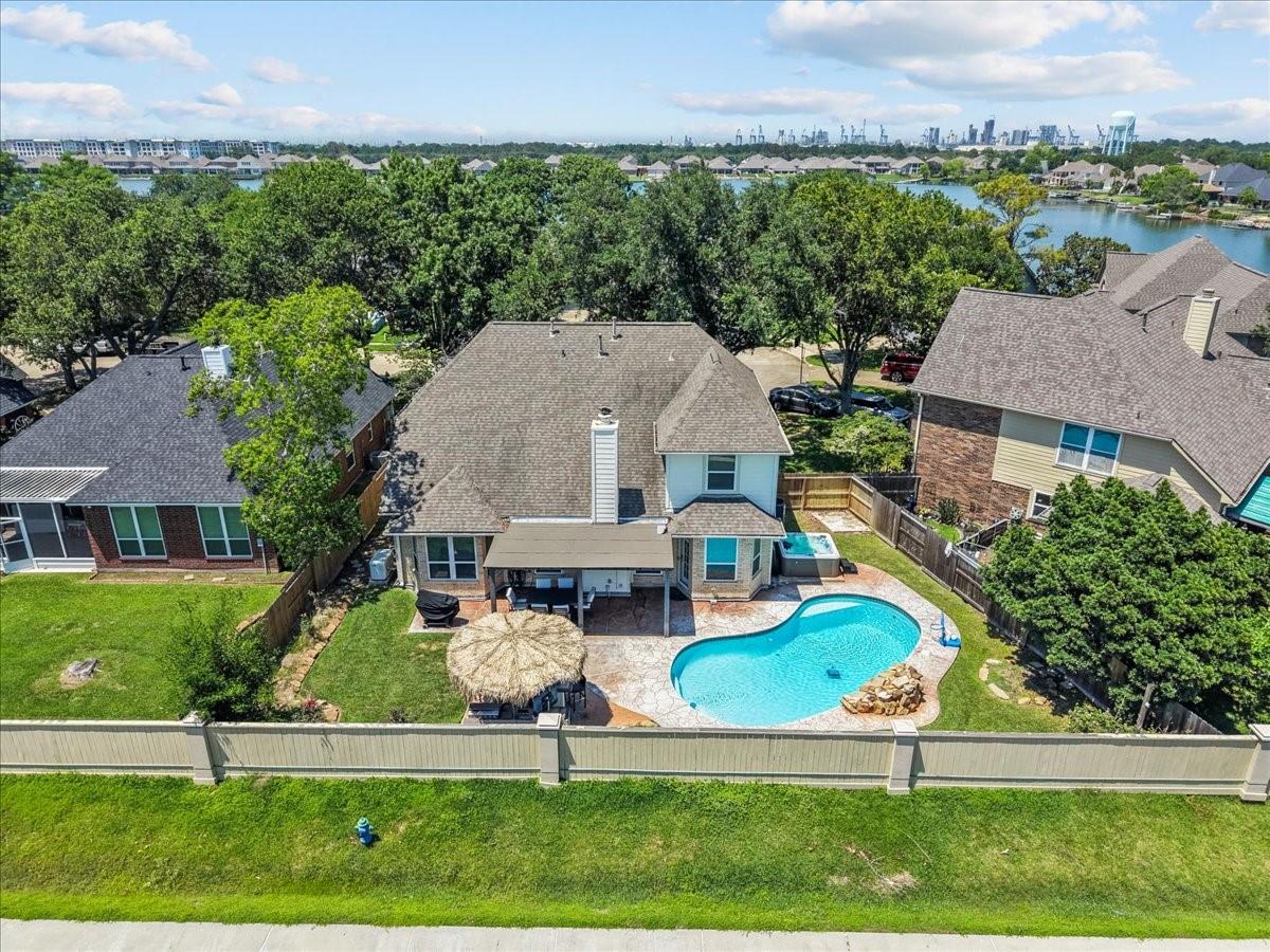 Image 1: Private backyard oasis with pool, spa, covered pat